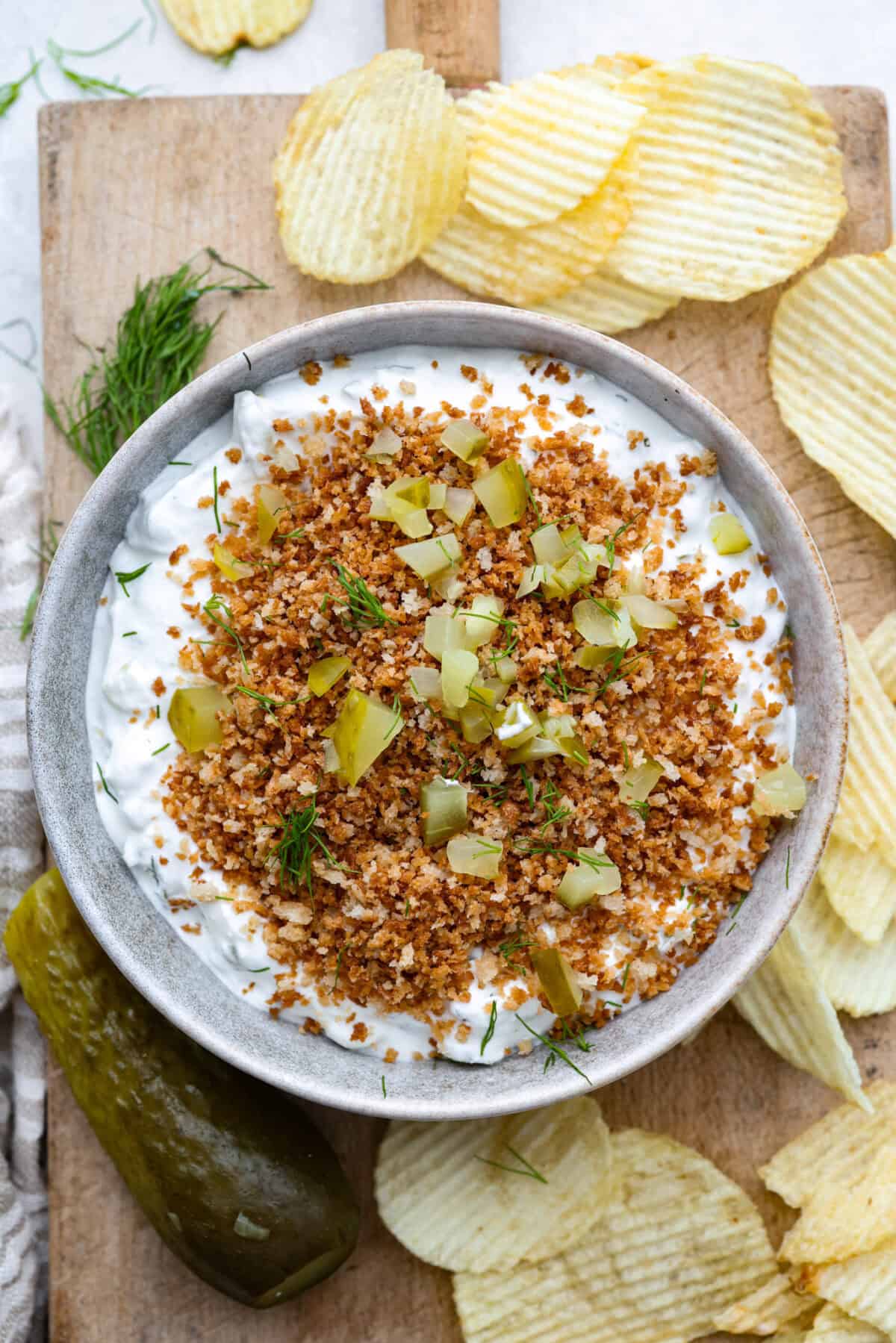 Overhead shot of a bowl of fried pickle dip.