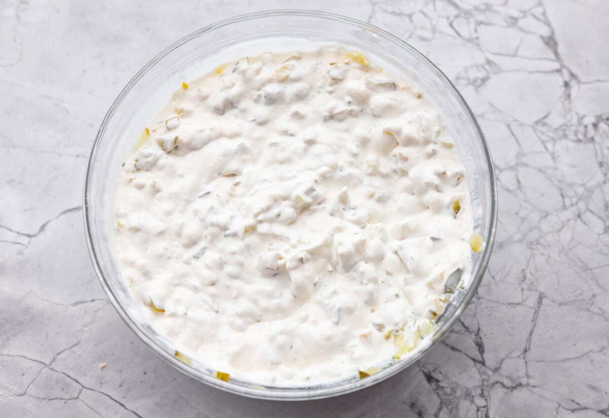 Dip ingredients mixed together in a bowl.